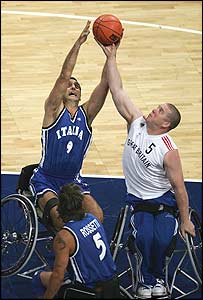 GB's Fred Howley goes up against Italy's Salvatore Cherchi