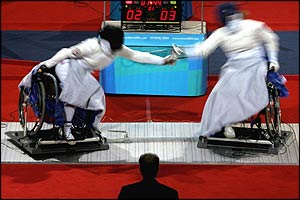 Female athletes compete in the wheelchair fencing competition 