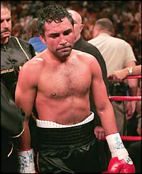 Oscar De La Hoya looks distraught after losing to Bernard Hopkins