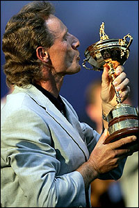 Skipper Bernhard Langer kisses the trophy