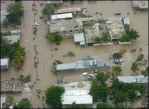An aerial view of the northern coastal city of Gonaives, where roads have turned into rivers and crops are completely covered by water