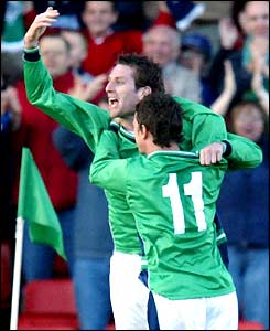 James Quinn and Phillip Mulryne celebrate Northern Ireland's equaliser