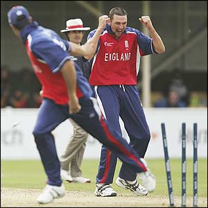 Steve Harmison celebrates as Andrew Symonds is run out by Michael Vaughan