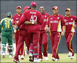 Malik returns to the pavilion as the West Indies celebrate