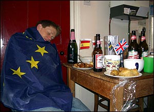 Empty bottles and remains of food after an enlargement party in Cambridge