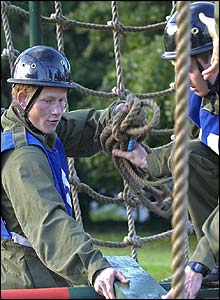 Prince Harry tackles an obstacle course