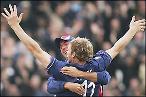 England skipper Michael Vaughan hugs Andrew Flintoff