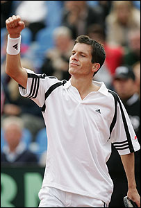 Henman battles back