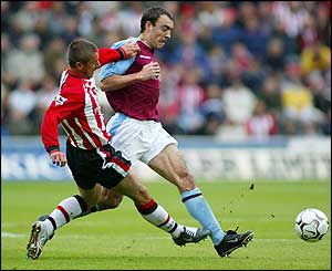 Phillips tackles McCann