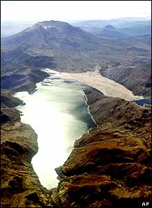 Mount St. Helens looms over Spirit Lake, still full of debris (centre right) from the volcano's 1980 eruption, 3 October 2004