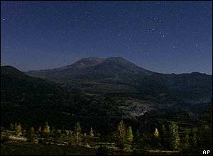 Mount St Helens is seen against a star-filled sky