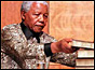 Nelson Mandela with the TRC report