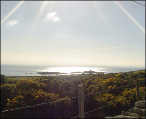 The beacon at Rhos beach, taken by Lucy Morgan, from Anglesey