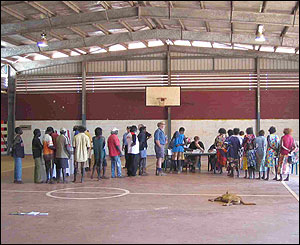 Men and women line up separately to vote at Warrauwi