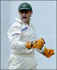 Gilchrist shows his delight as Sourave ganguly is run out
