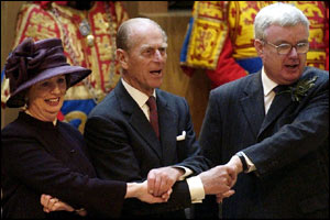 The Duke of Edinburgh joins in Auld Lang Syne with MSPs Trish Godman and Murray Tosh