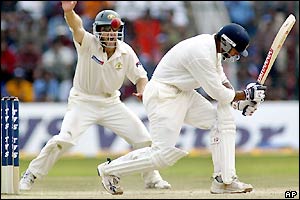 Simon Katich successfully appeals for the wicket of Rahul Dravid who top scores for India with 60 runs