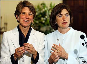 Hillary (L) and Julie Goodridge (R) display their rings after their marriage ceremony
