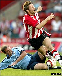 James Beattie is challenged by Matthew Le Tissier 