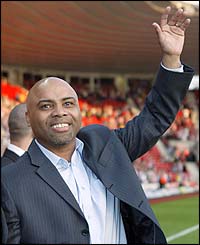 Danny Wallace salutes the crowd before the start of the testimonial