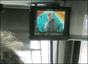 CCTV pictures on a screen above the steering wheel