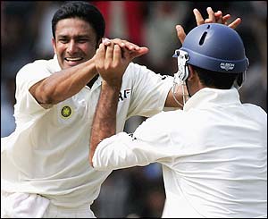 Anil Kumble celebrates claiming the wicket of Damien Martyn