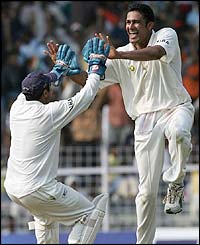 Kumble claims the wicket of Adam Gilchrist