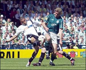 Celtic defender Stanislav Varga (r) and Ritchie Byrne battle for the ball