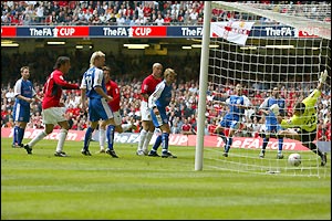 Man Utd's patience pays off on the stroke of half-time as Ronaldo times his run to perfection to head home Gary Neville's cross 