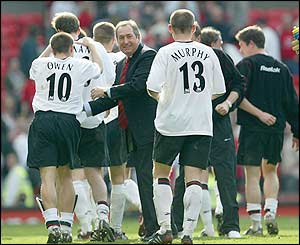 Liverpool players celebrate beating Manchester United 1-0 at Old Trafford in April 2004