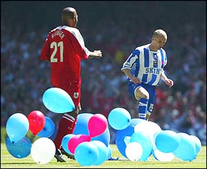 Nathan Jones of Brighton and Tony Rougier of Bristol City