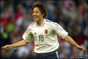 Shinji Ono celebrates after scoring for Japan