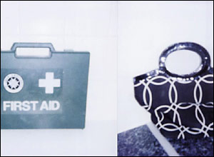 A first aid kit and a handbag