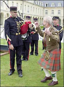 Ex-Royal Signalman William Young, from Glasgow, danced a jig for a French piper
