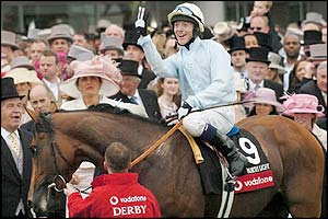 Kieren Fallon celebrates winning the Derby