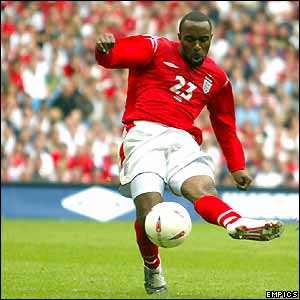 Darius Vassell shoots to score his second