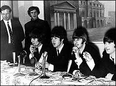 (L-R) Brian Epstein, George Harrison, Paul McCartney, Ringo Starr, John Lennon