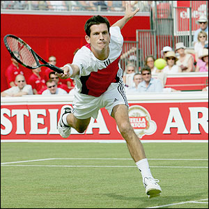 Tim Henman in action against Karol Beck