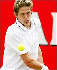 Russia's Igor Andreev struggles against Hewitt 