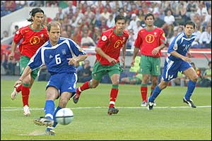 Greece's Angelo Basinas scores a penalty