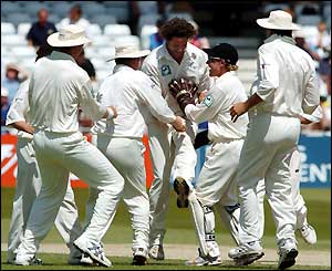 Chris Cairns celebrates the wicket of Andrew Strauss