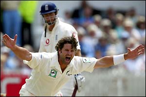 Chris Cairns celebrates after trapping Michael Vaughan LBW