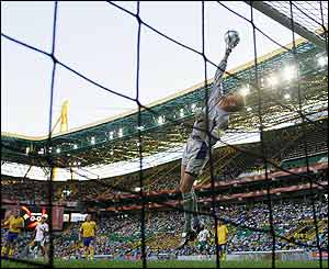 Andreas Isaksson of Sweden tips a shot over the bar