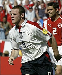 Wayne Rooney celebrates his 23rd min goal