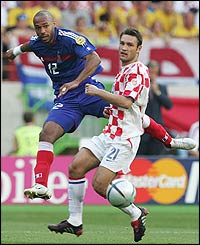 Thierry Henry shoots just wide