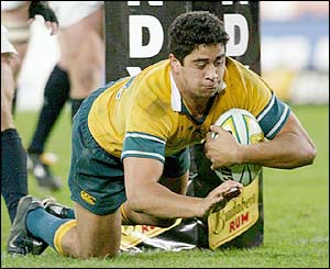 Australia's Morgan Turinui scores a try