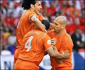 Wilfred Bouma is congratulated after giving Holland the lead in the third minute
