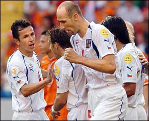 Jan Koller celebrates after pulling a goal back for the Czech Republic