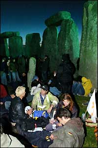 Revellers waiting for sunrise at Stonehenge