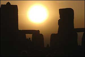 Sun rising over Stonehenge